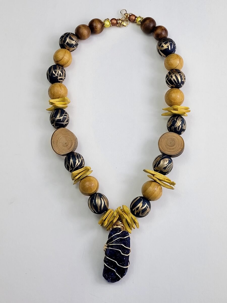 Navy, gold, wood, and yellow beaded necklace set.