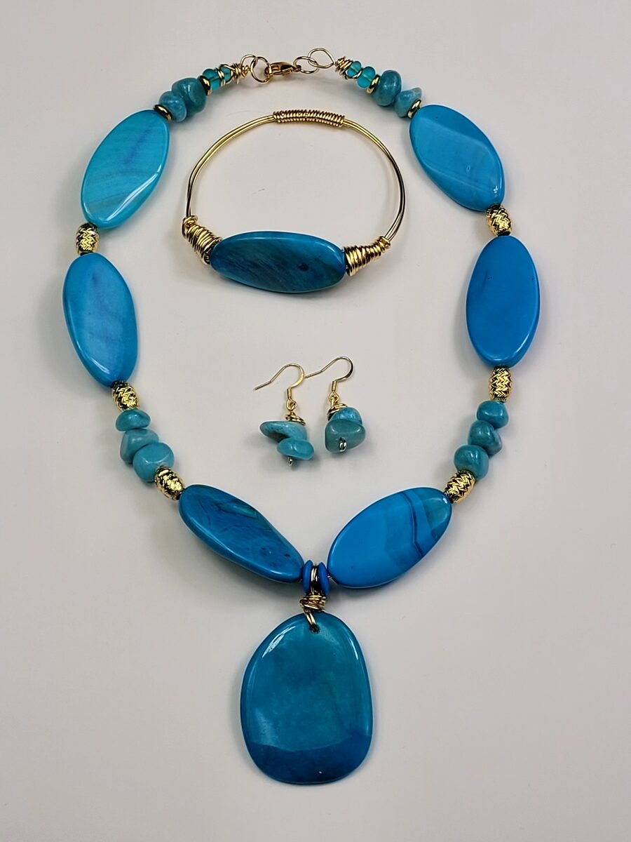 Teal turquoise slab pendant beaded necklace.